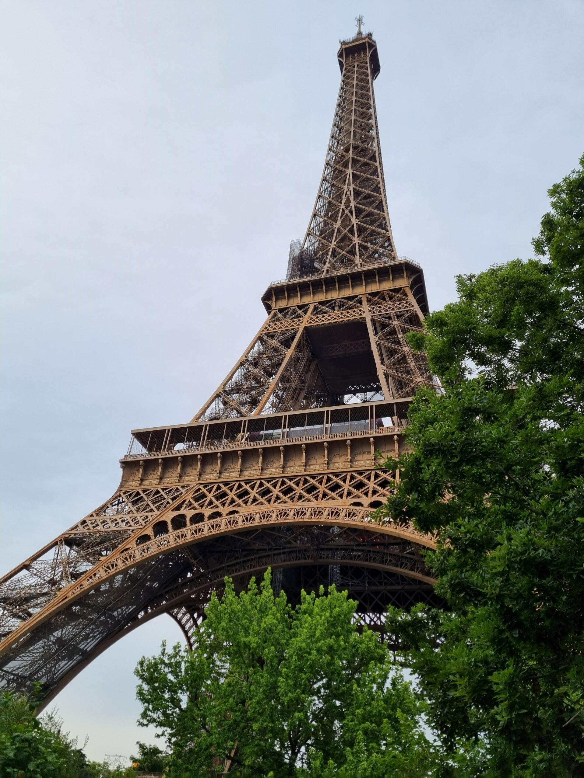 The Eiffel Tower shot from below at an angle